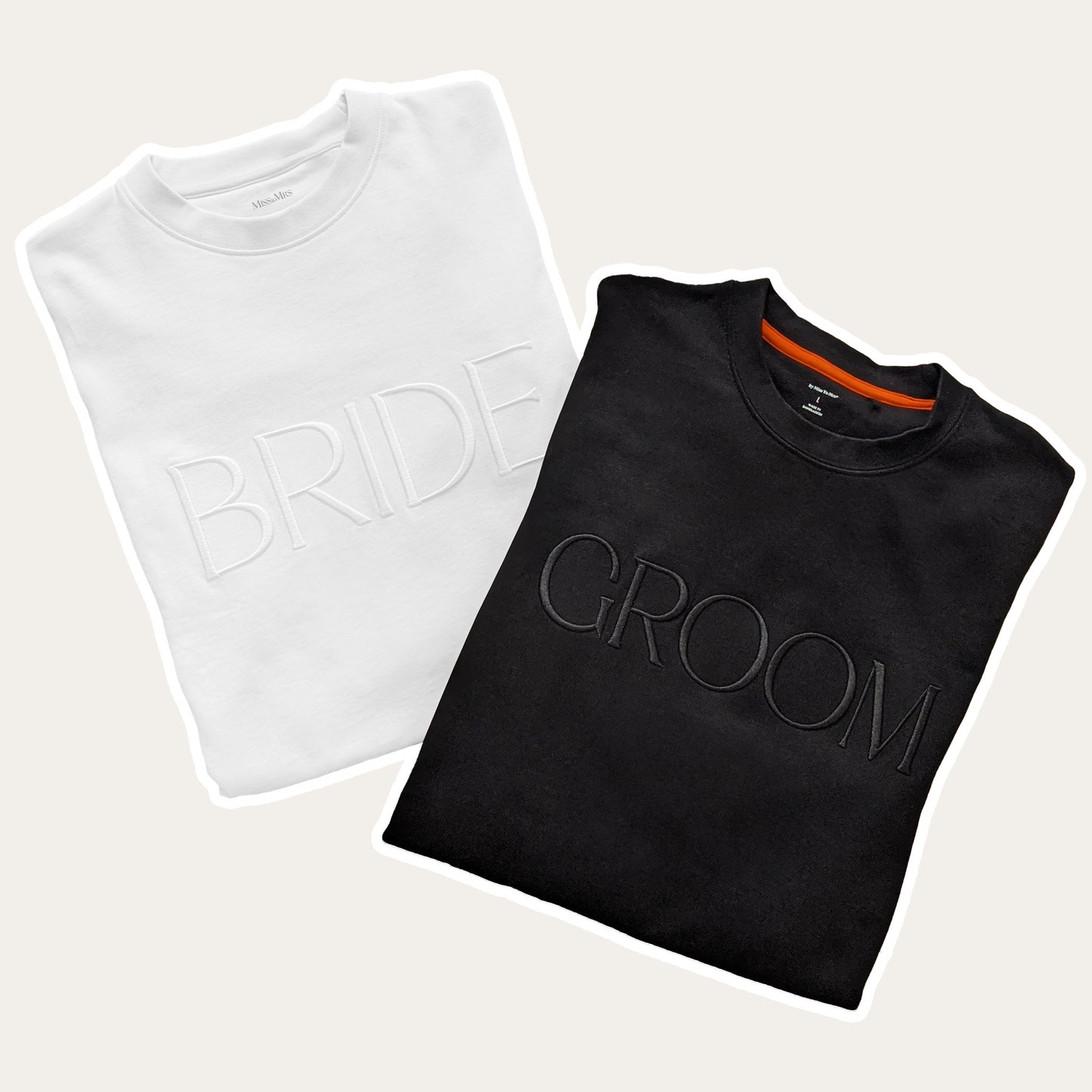 The set of two matching crewneck embroidered sweatshirts, white Bride sweatshirt and black Groom sweatshirt. Unisex fit, made of cotton.