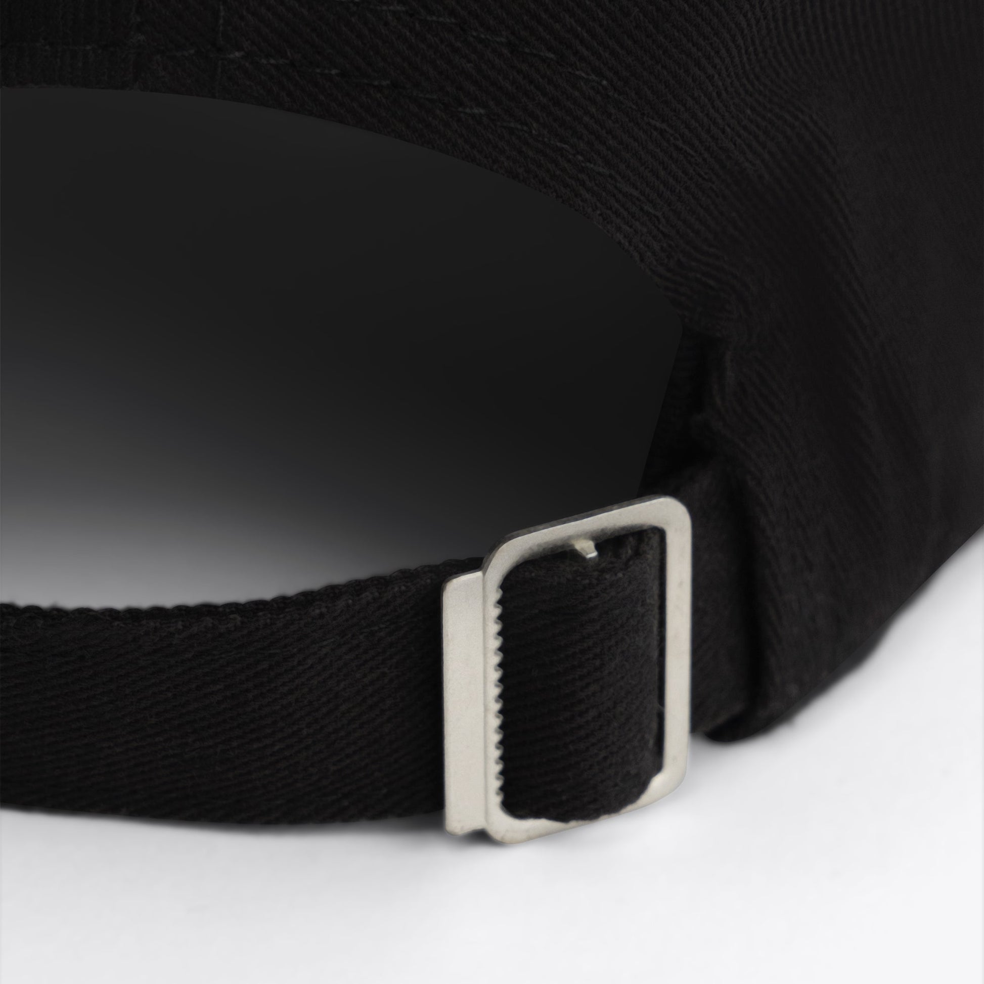 Black-on-black embroidered GROOM baseball hat comes with an adjustable brass buckle. Made of 100% cotton twill.